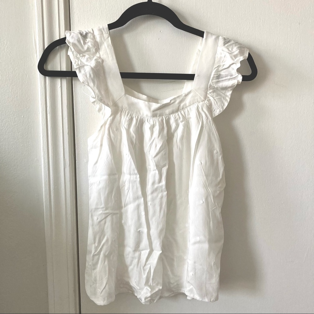 White ruffled dress top
